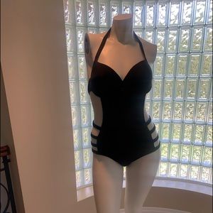 NWOT. Cut out one piece bathing suit in black size XL.